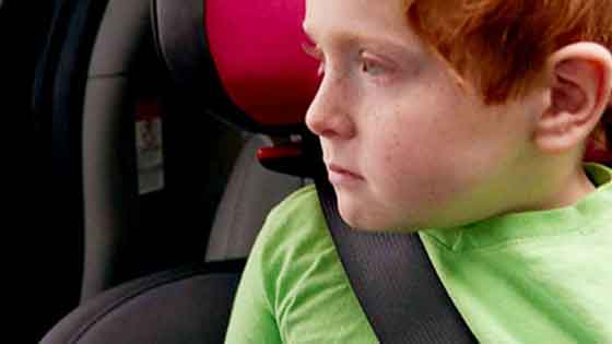child in booster seat